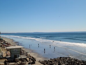 On the beach, sun-loungers, beach towels
