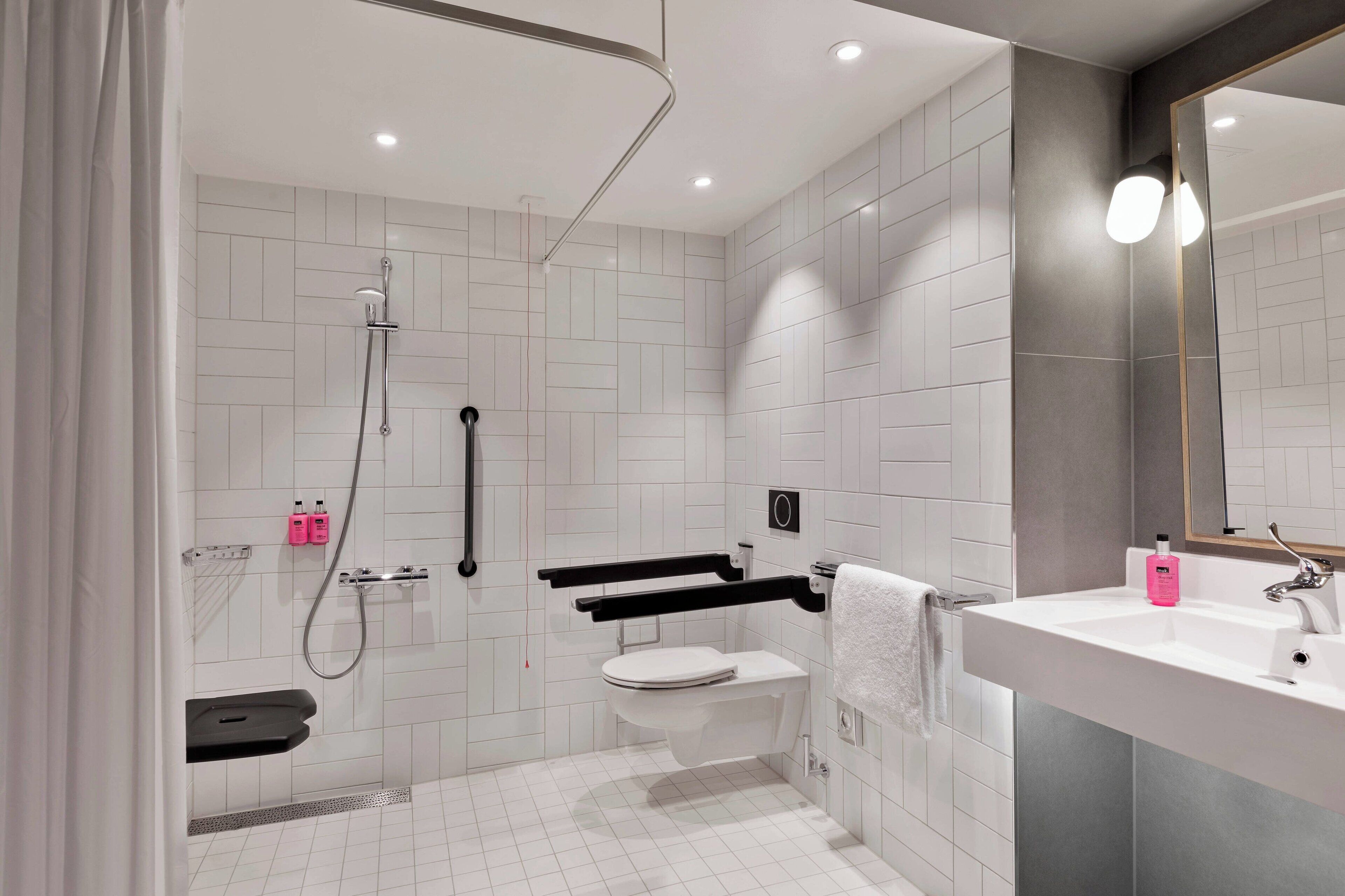 room, 1 queen bed with sofa bed, city view | bathroom | shower, designer toiletries, hair dryer, soap