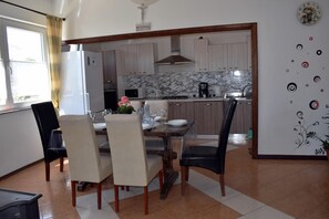 Family Apartment, Multiple Bedrooms, 2 Bathrooms (Pool Apartment Bakija) | Dining - Pool Apartment Bakija (Pakostane)