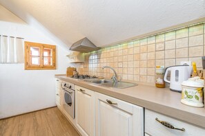 Family Chalet, Multiple Bedrooms, Mountainside (Homestead Bahor With Whirlpool) | Private kitchen | Fridge, oven, stovetop, dishwasher - Homestead Bahor With Whirlpool (Crnomelj)