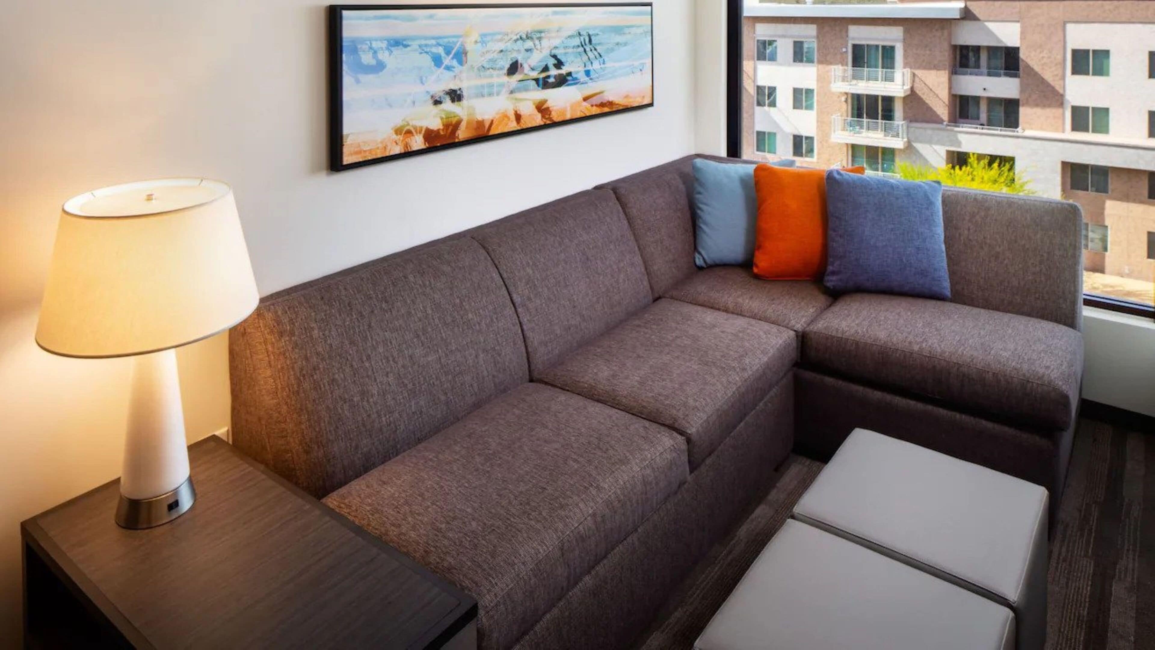 hypo-allergenic bedding, desk, laptop workspace, blackout curtains