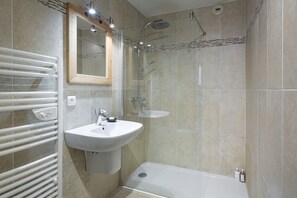 Combined shower/bathtub, hair dryer