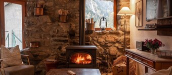 Private terrace, warm & cosy lounge with fireplace