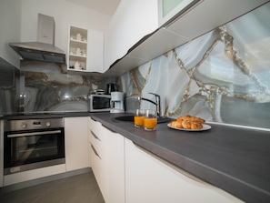 Departamento (Two-Bedroom Apartment with Terrace an) | Cocina privada | Refrigerador