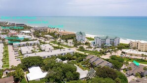 An aerial view of a coastal town with visible landmarks such as Hampton Park, Citrus Grill, and Orchid Island Brewery. - Central Beach 2 BR under the oaks on Cardinal Drive; 2 min, walk to beach (Vero Beach)