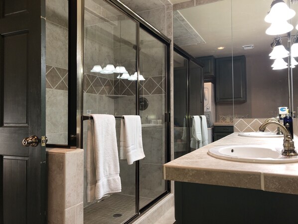 Shower, hair dryer, towels, soap