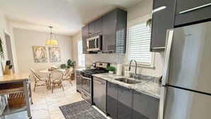 Coffee/tea maker, fridge, microwave, oven