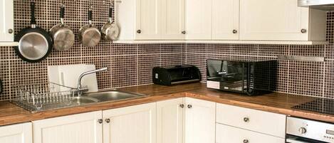 Microwave, dishwasher, high chair, freezer