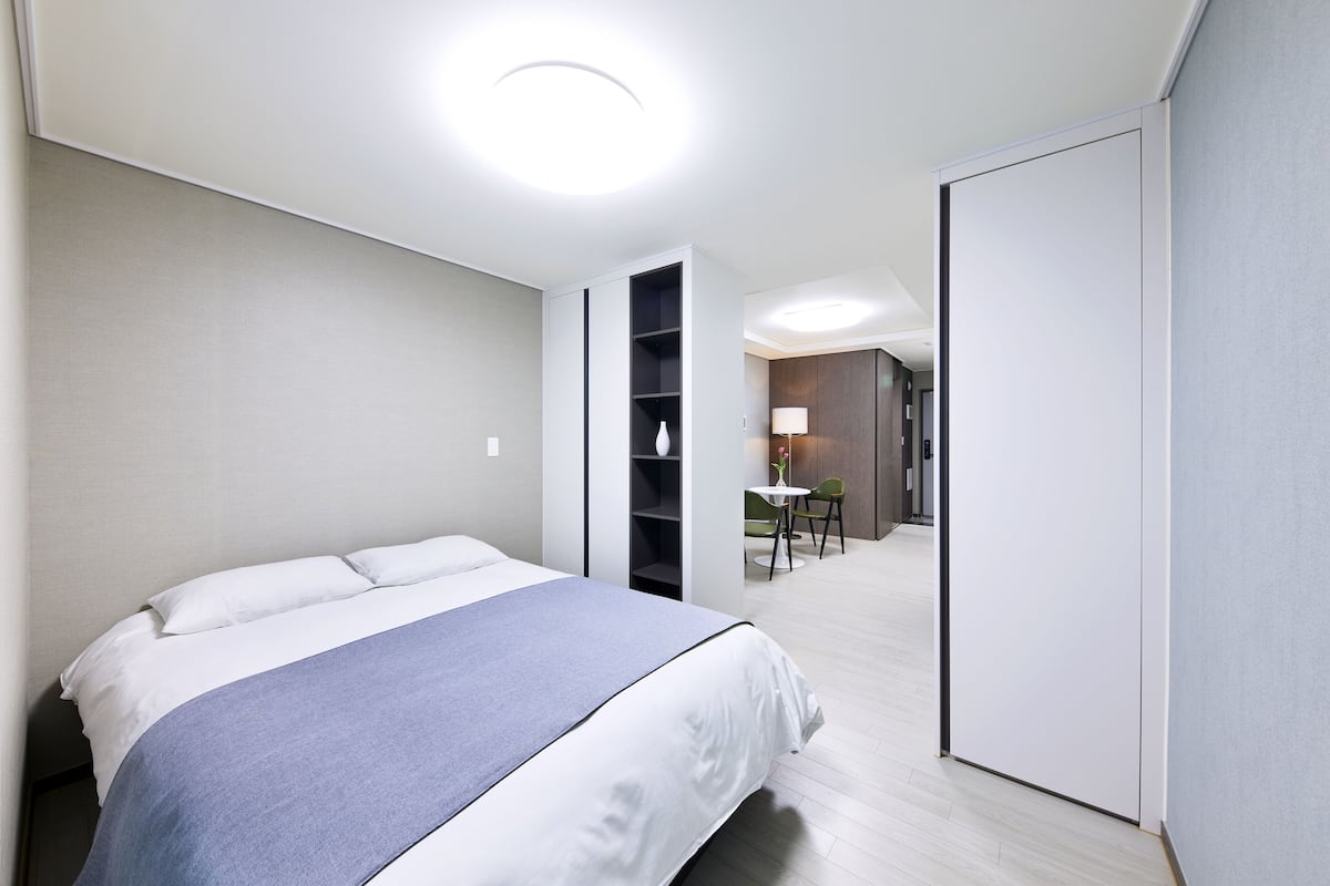 Desk, laptop workspace, blackout curtains, free WiFi
