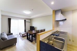 Deluxe Family Suite, Non Smoking | Living area | 40-inch flat-screen TV with digital channels, TV - Bears Stay Kumejima Ifu Beach (Kumejima)