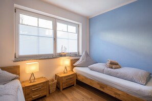 2 slaapkamers, een strijkplank/strijkijzer, gratis wifi, beddengoed