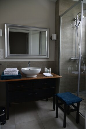 Shower, hair dryer, towels, soap