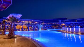 Indoor pool, pool umbrellas, pool loungers