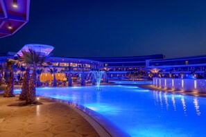 Indoor pool, pool umbrellas, sun loungers