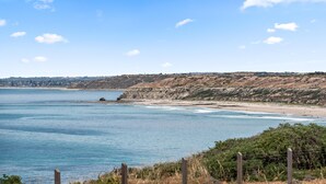 A coastal landscape with a beach, cliffs, and a clear sky. - Percival Point ~ Port Willunga - Sweeping Pt. Willunga Sea Views (Port Willunga)