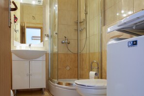 Shower, free toiletries, hair dryer, towels