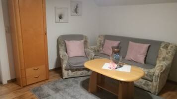 Apartment | Living area | 20-inch TV with digital channels