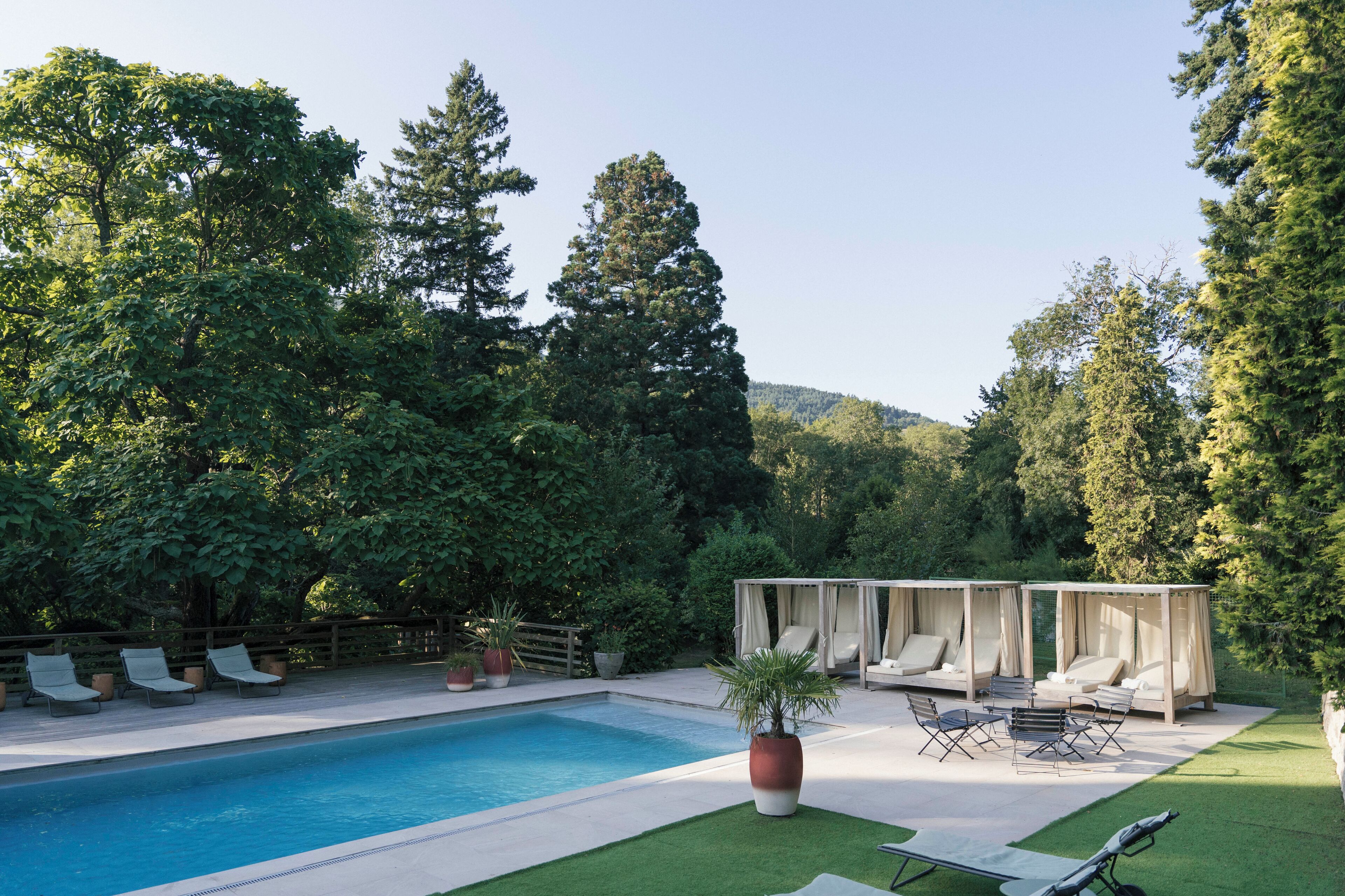 indoor pool, seasonal outdoor pool, pool umbrellas, pool loungers