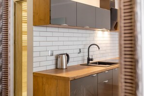 Lägenhet - 2 sovrum - terrass | Eget pentry | Mikrovågsugn, diskmaskin, kaffe- och tebryggare och barnstol