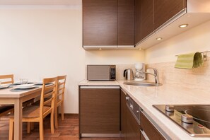 Apartment, 1 Bedroom, Balcony, Beachside | Private kitchenette | Microwave, stovetop, dishwasher, coffee/tea maker