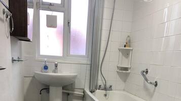 Apartment | Bathroom | Combined shower/tub, deep soaking tub, hair dryer, towels