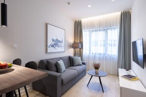 Deluxe Apartment | Living area | Flat-screen TV - Hestia - Ippokratous 35 (Athens)