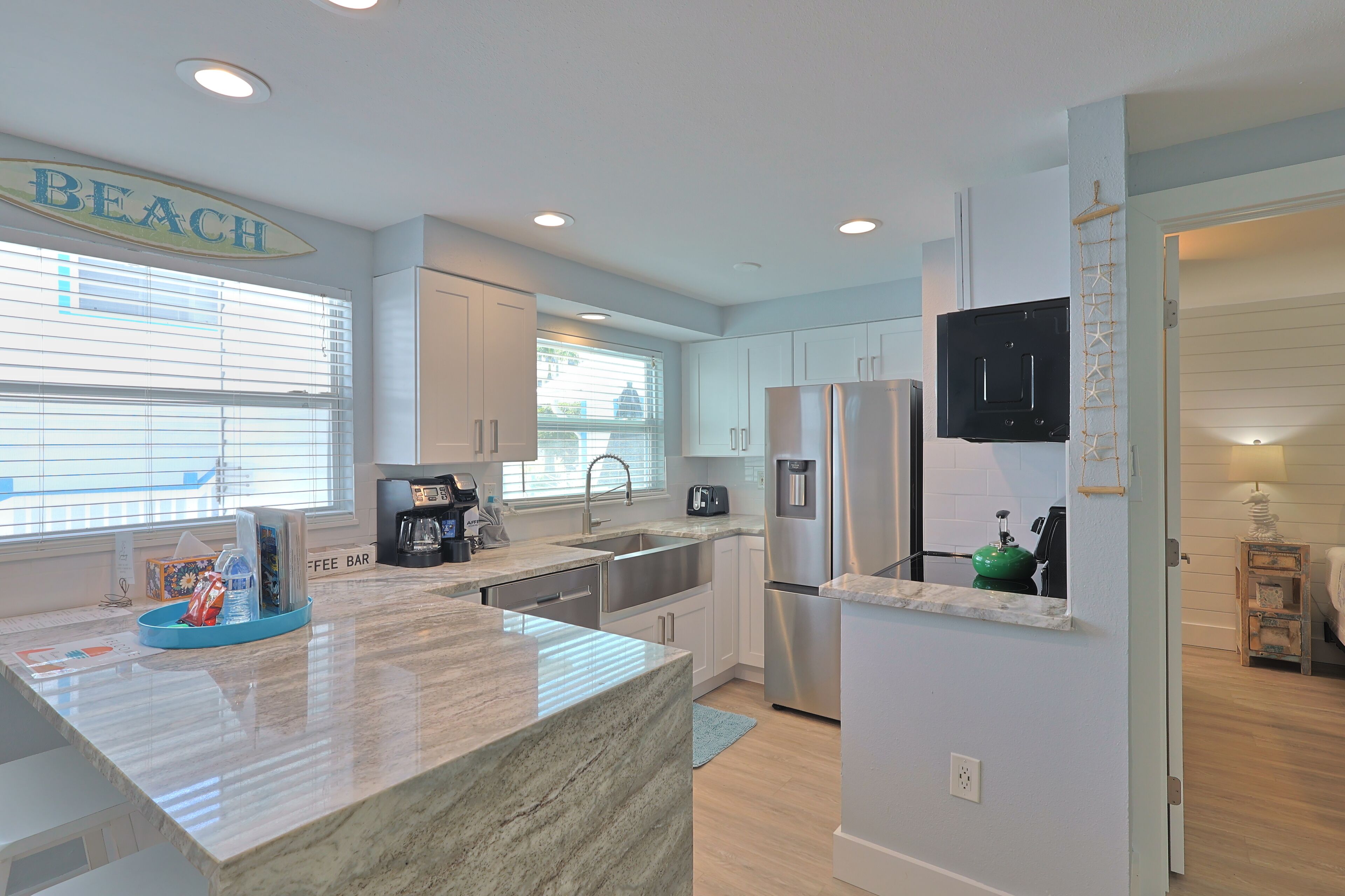 Microwave, stovetop, dishwasher, coffee/tea maker