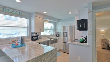 Microwave, stovetop, dishwasher, coffee/tea maker