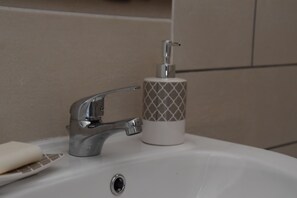 Shower, soap, toilet paper