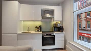 Appartement, 1 slaapkamer | Privékeuken | Een koelkast, een vaatwasser, een espressoapparaat