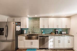 Microwave, stovetop, dishwasher, coffee/tea maker