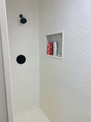 Shower, towels, soap, shampoo