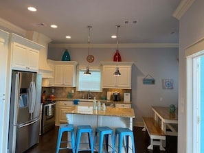 Coffee/tea maker, fridge, microwave, oven