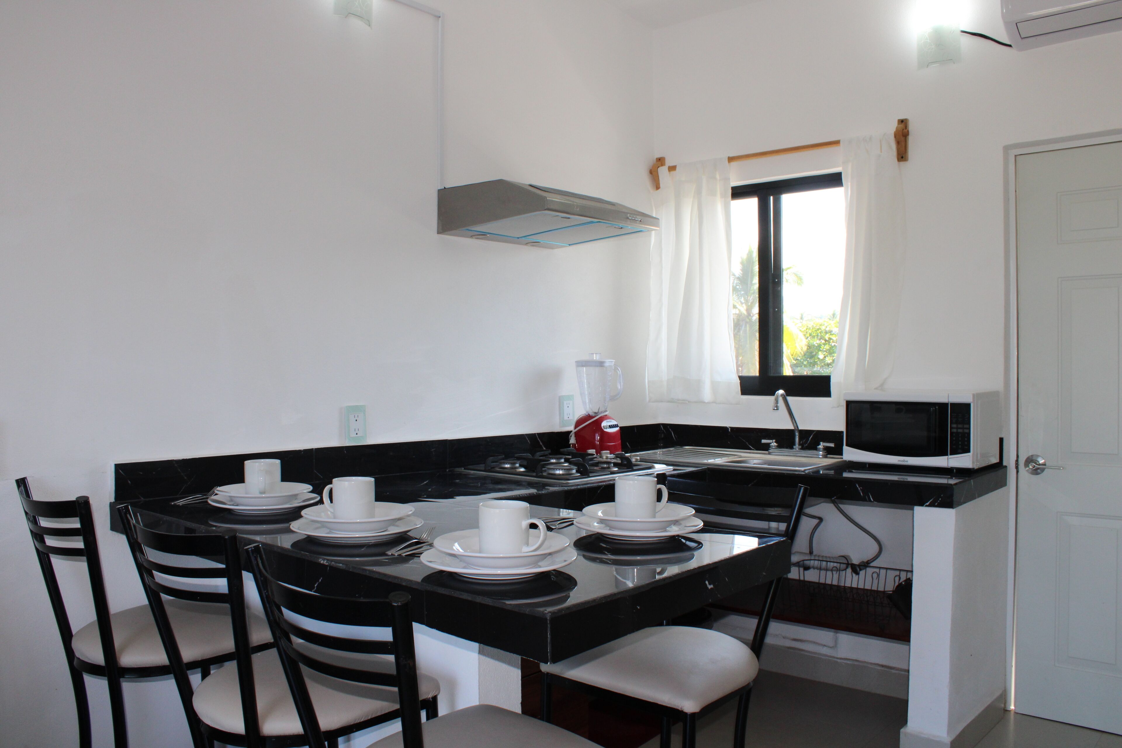 Microwave, stovetop, coffee/tea maker, toaster