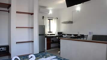 Standard Studio Suite | Living area | 32-inch LCD TV with digital channels, TV