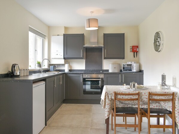 Oven, high chair, cookware/dishes/utensils