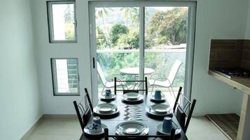 Junior Suite with Balcony | Private kitchen | Full-sized fridge, microwave, stovetop, blender