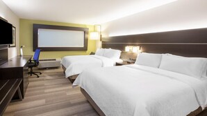 A hotel room with two beds, a desk, a chair, a TV, and a projector screen. - Holiday Inn Express Kermit By IHG (Kermit)
