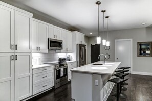 Fridge, microwave, oven, stovetop - Biltmore Avenue Balcony Condo (Asheville)