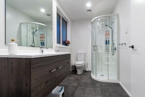 Bathtub, hair dryer, towels, soap