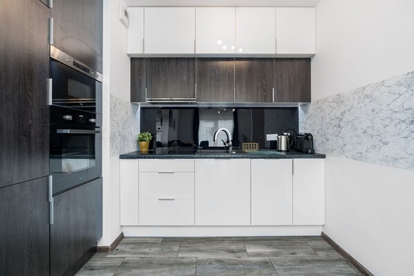 Apartment | Private kitchen | Full-sized fridge, microwave, oven, stovetop