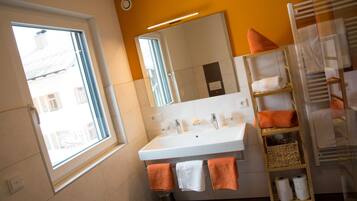 Shower, towels, toilet paper