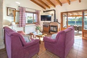 Flat-screen TV, fireplace, DVD player, ping pong