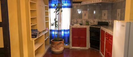 Superior Apartment | Private kitchenette | Full-size fridge, oven, stovetop, coffee/tea maker