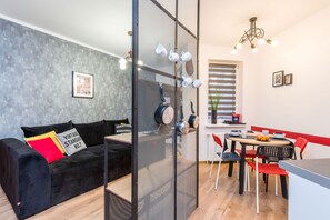 Appartement | Woonruimte | Een 40-inch flatscreentelevisie met kabelzenders en een televisie