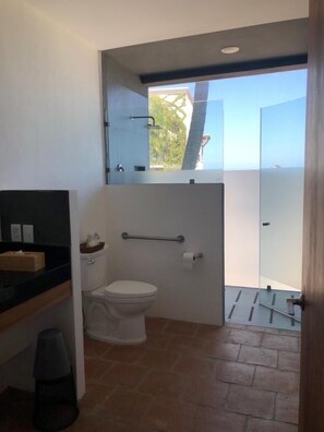 Bathtub, hair dryer, towels, soap
