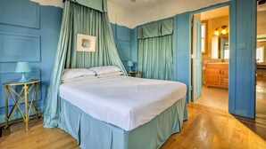 A bedroom with a bed, curtains, a chandelier, a bedside table, and a nightstand. - 2 Bedroom/2 Bathroom Stylish Designer Flat (San Francisco)