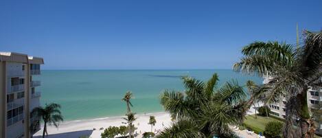 On the beach, sun-loungers, beach towels