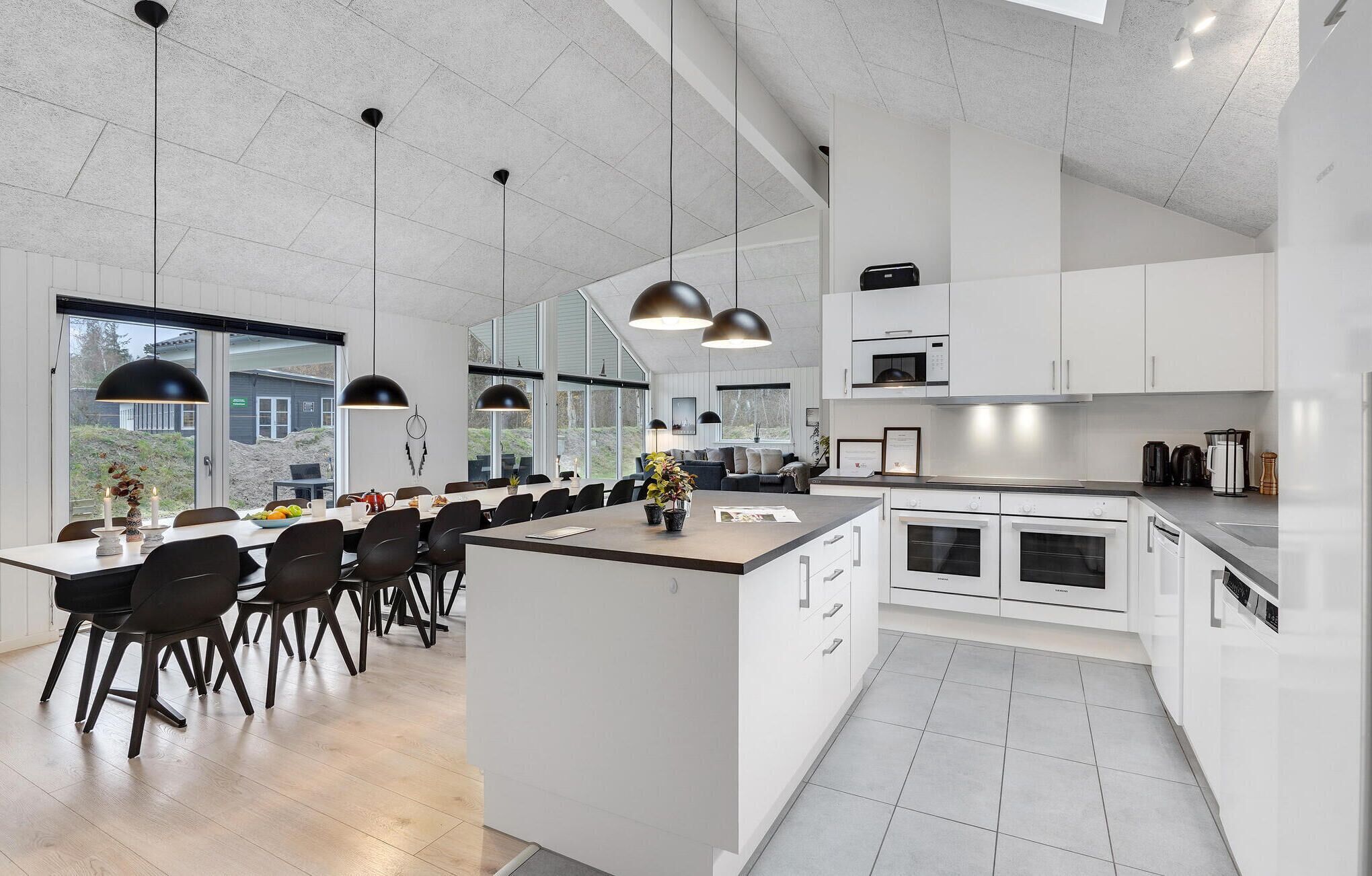 Fridge, stovetop, dishwasher, coffee/tea maker