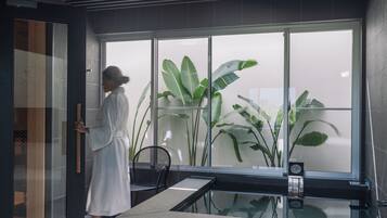 Separate bathtub and shower, rainfall showerhead, free toiletries